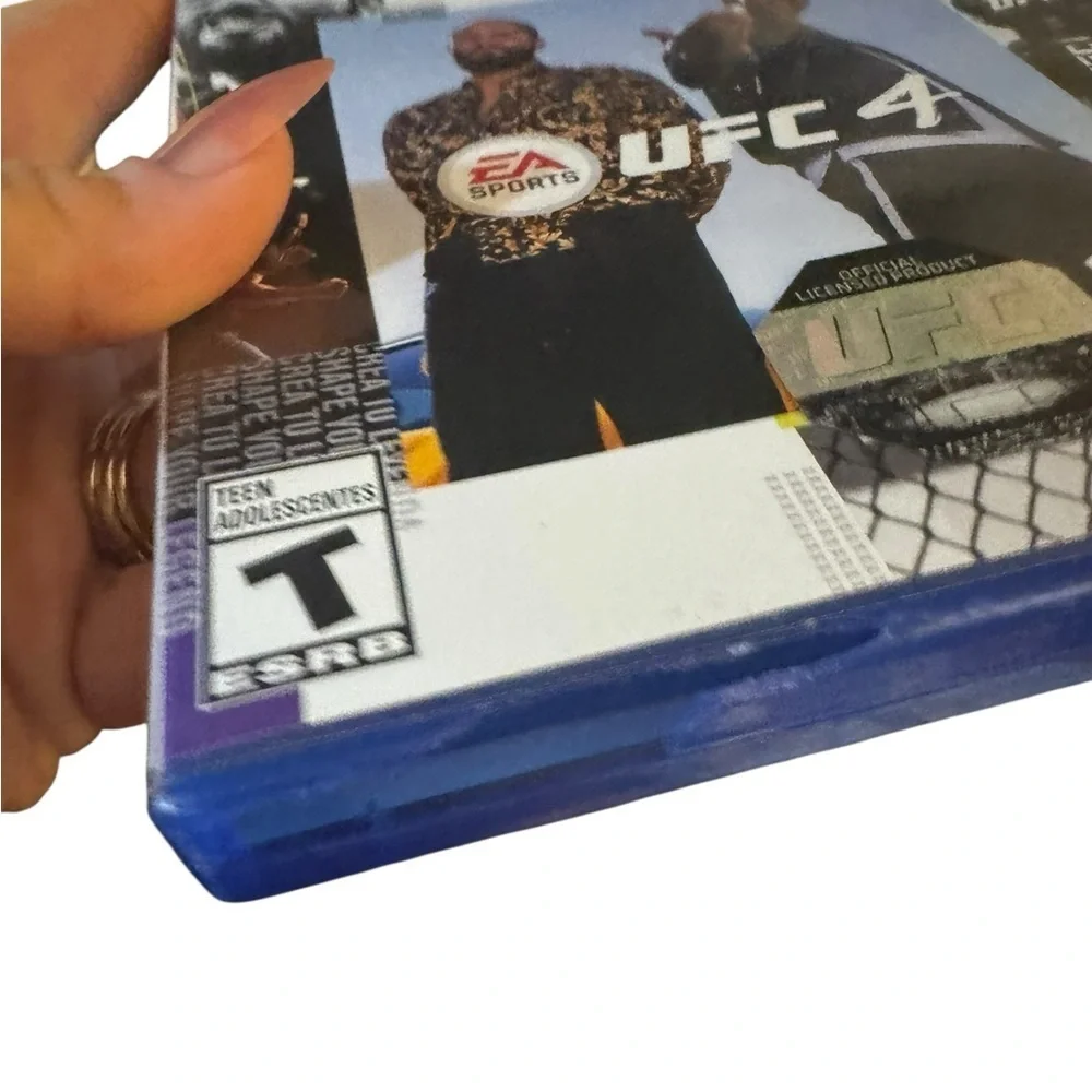 Used UFC 4 for PS4 - crack on case see pics